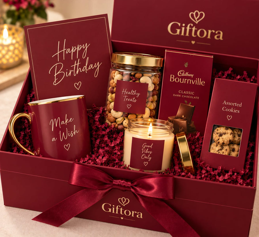 Birthday gift box with mug, assorted nuts, chocolate, cookies and candle